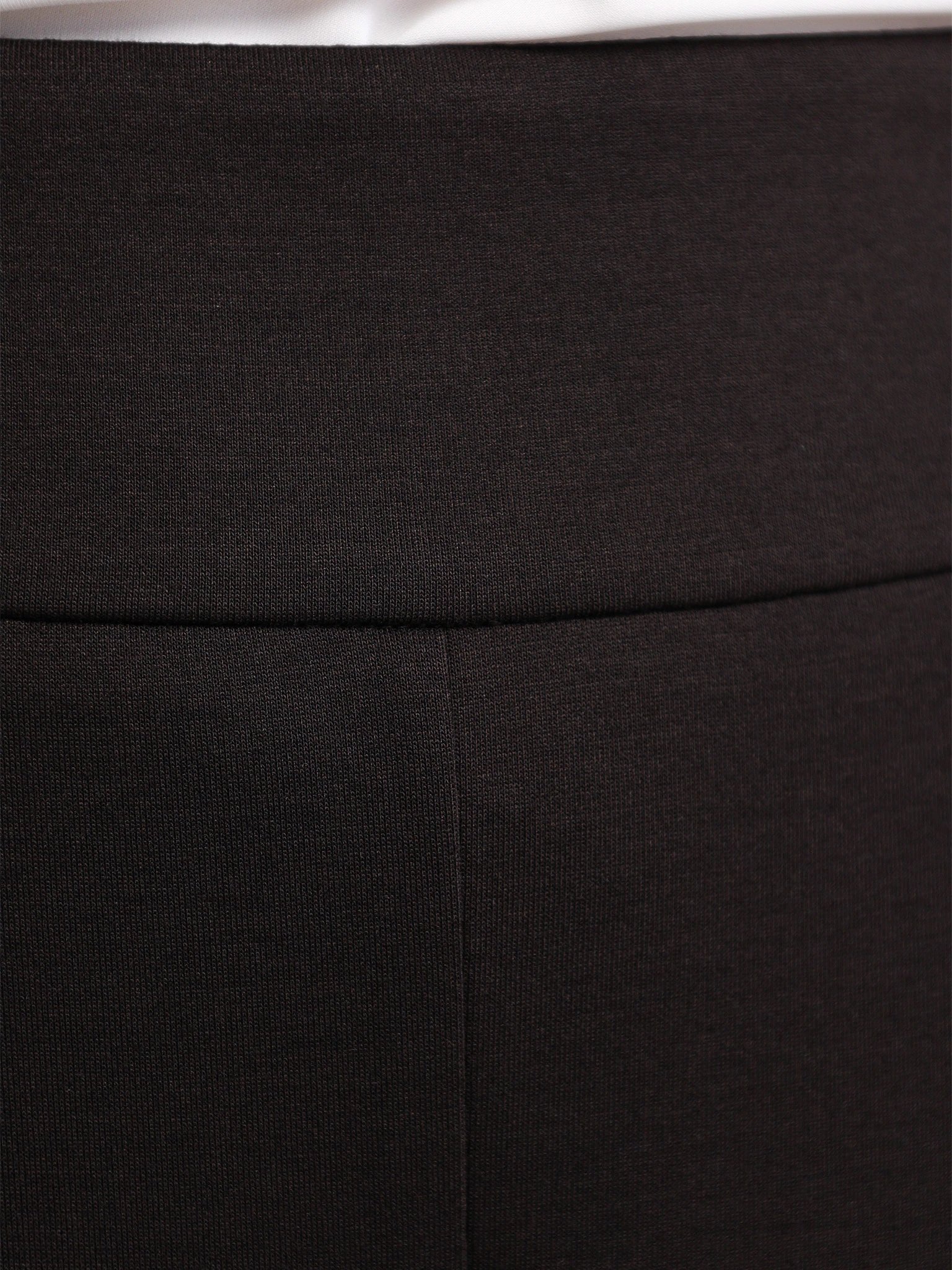 Брюки трикотажные темно-коричневого цвета расклешенного кроя